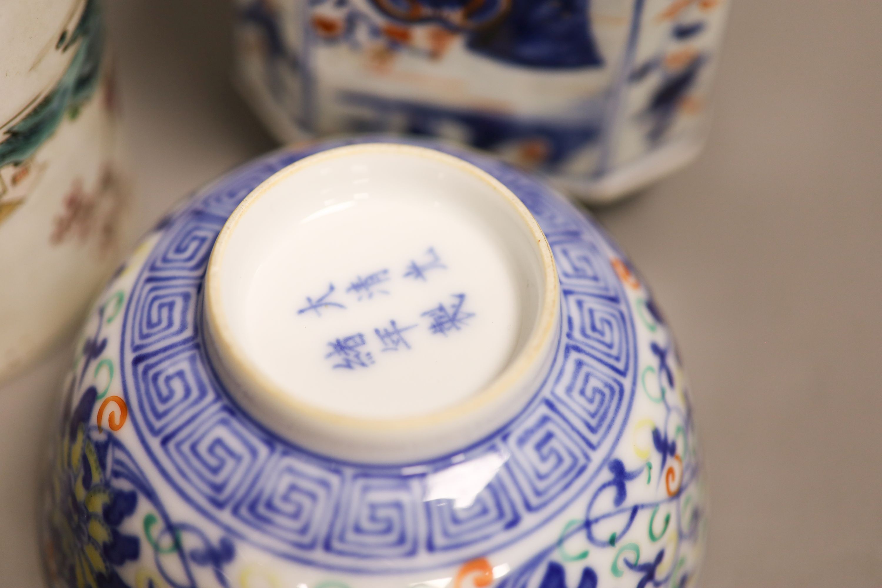 A Chinese famille rose mug, a Chinese Imari tea caddy and a doucai bowl, 18th century and later